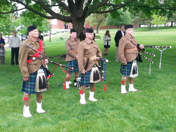 <p>Bagpipers perform at the annual ceremony</p>